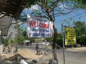 Welcome Back to Tuy Hoa Donut Dollies sign at Bob's Cafe American in Tuy Hoa, Vietnam