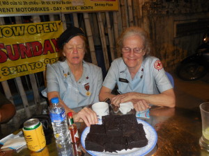 Here's Dorset and Mary, in their vintage Donut Dollies uniforms, at Bob’s Cafe American in Tuy Hoa with a plate of fresh made brownies thanks to the Cafe’s owner and Vietnam Veteran, Bob Johnston